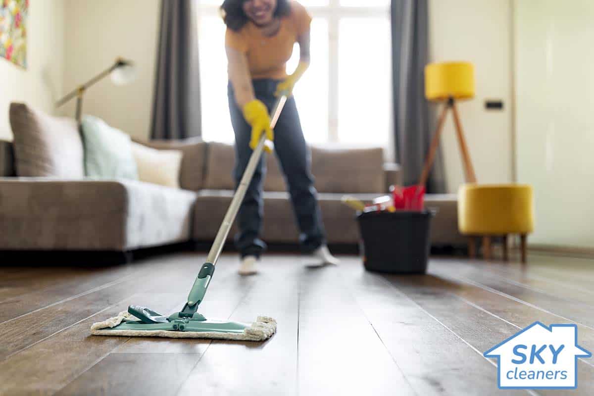 woman cleaning her house