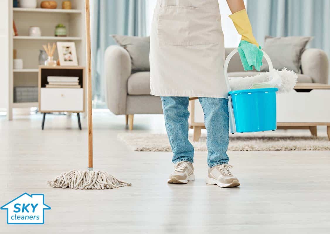 person preparing to do domestic cleaning